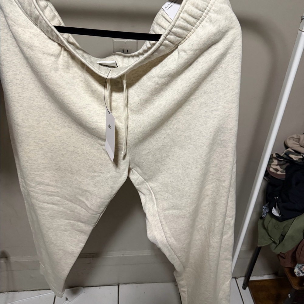 NWT**WOMANS. NIKE Cream Jogger Pants